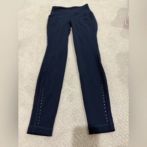 Lululemon Navy Blue Athletic leggings/pants with reflective dot accents. Size 4